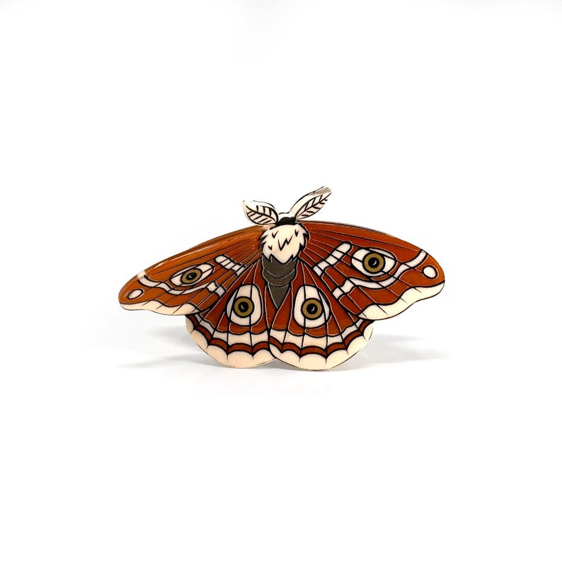 "Artistic Lunar Moth and Death's Head Moth hair accessory with striking details and a moody vibe."