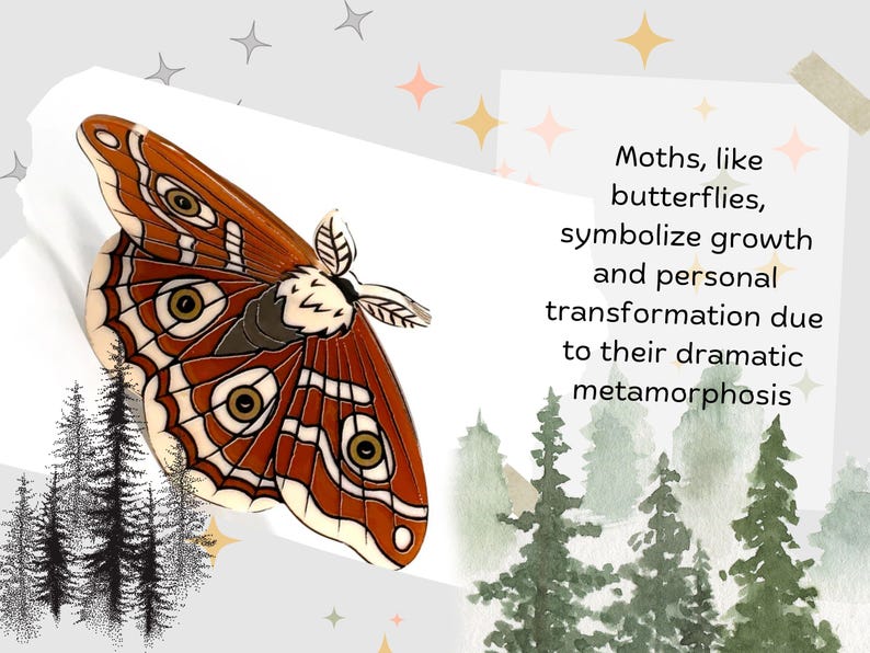 "Close-up of a Lunar Moth hair clip featuring a Death's Head motif, showcasing fine craftsmanship."