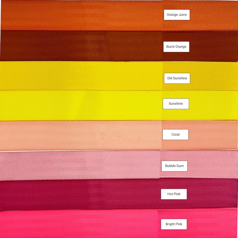 May include: A collection of eight fabric ribbon samples in various shades of orange, yellow, pink, and red. The colors are labeled from top to bottom: Orange Juice, Burnt Orange, Old Sunshine, Sunshine, Coral, Bubble Gum, Hot Pink, and Bright Pink.