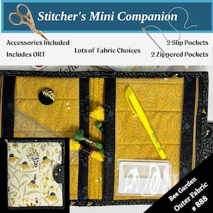 May include: A yellow and black fabric Stitcher's Mini Companion with the text "Stitcher's Mini Companion". The companion includes accessories, two slip pockets, and two zippered pockets. The outer fabric is "Bee Garden" #888.