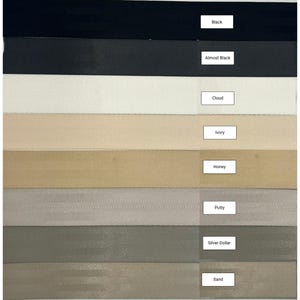 May include: Nine fabric swatches in different shades of beige, brown, gray, and black. The swatches are labeled with the following names: Black, Almost Black, Cloud, Ivory, Honey, Putty, Silver Dollar, and Sand.