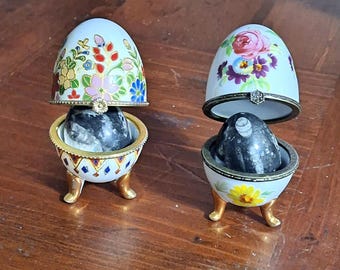 Pair of Porcelain Trinket Eggs Containing Orthacarus Stone Eggs
