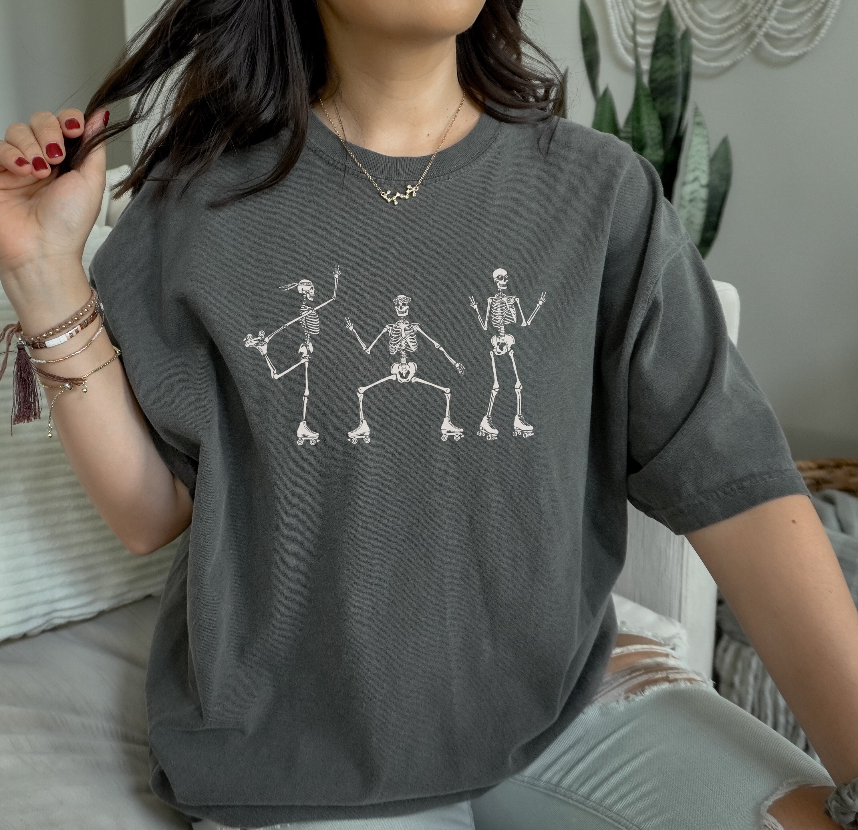 Discover Roller Skating Skeletons T-Shirt - Cozy Fall Tee, Vintage Look and Feel Oversized Shirt for Halloween