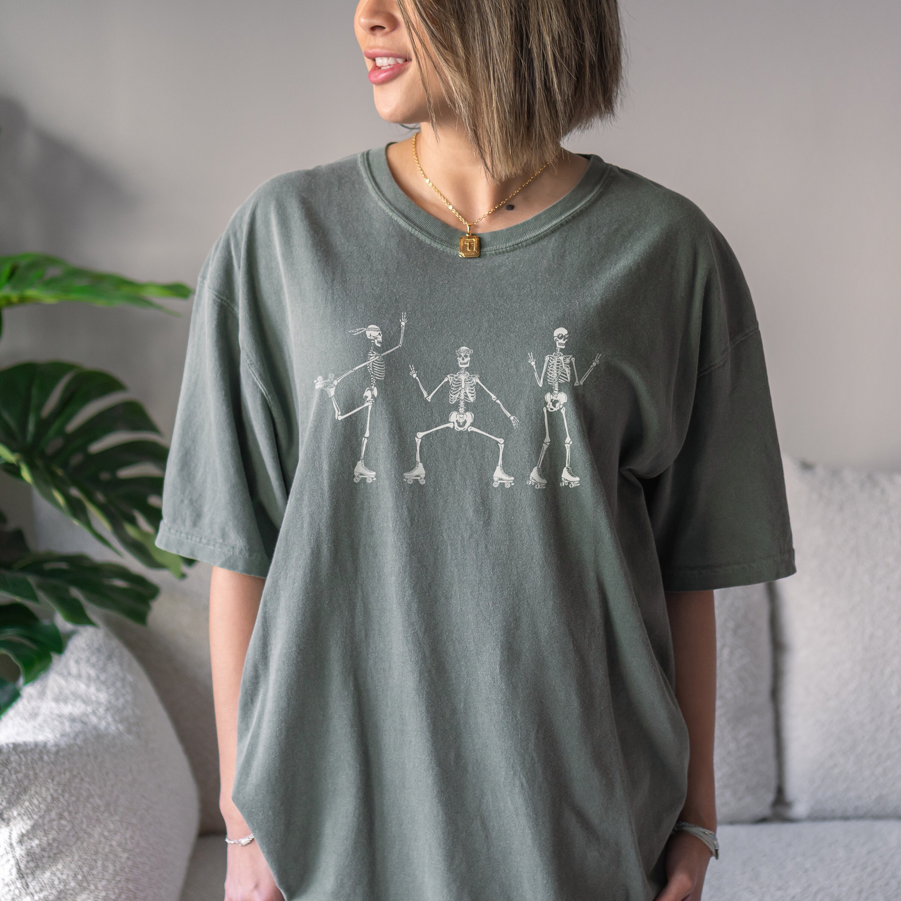 Discover Roller Skating Skeletons T-Shirt - Cozy Fall Tee, Vintage Look and Feel Oversized Shirt for Halloween