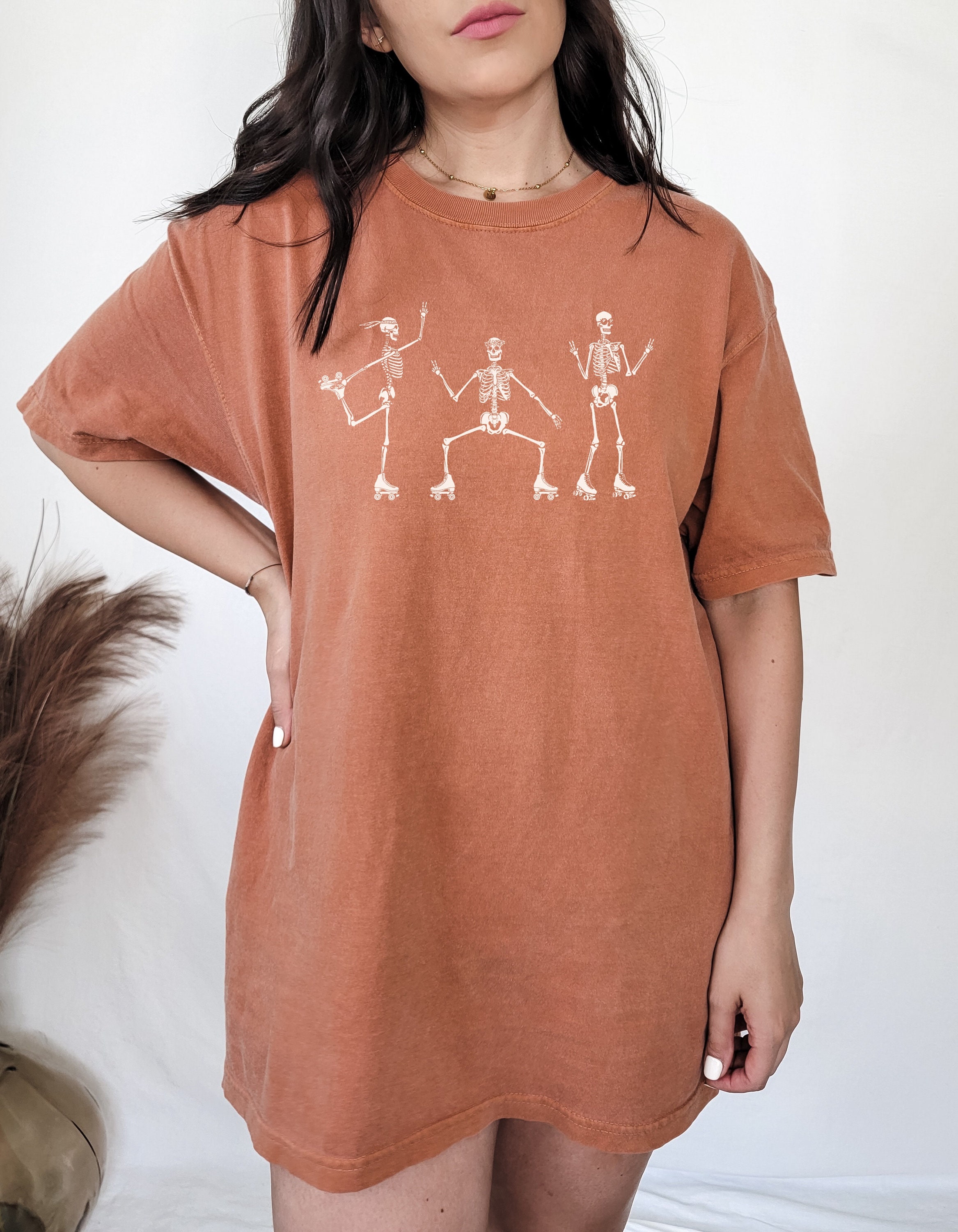 Discover Roller Skating Skeletons T-Shirt - Cozy Fall Tee, Vintage Look and Feel Oversized Shirt for Halloween