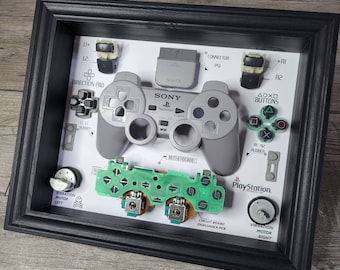 Diorama em caixa de sombra para controle duplo de PS1 com moldura preta para decoração de sala de jogos, joystick desmontado, presente decorativo.