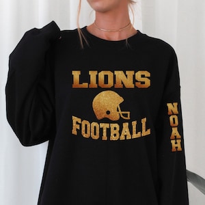 Football spirit wear long sleeve shirts, sweatshirts, & hoodies with name on sleeve and name and number on the back