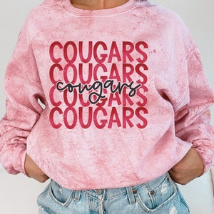 Custom Cougars mascot school spirit wear on Comfort Colors color blast tees & sweaters.