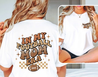 In my Football Mom Era leopard print t-shirts.