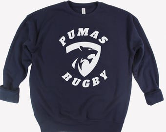 Pumas Rugby logo on adult Bella Canvas sweatshirts and hoodies.