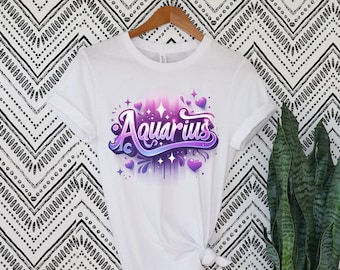 Aquarius faux airbrushed pink and purple t- shirts.