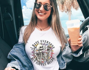 I hate everyone but coffee helps skeleton flower t-shirts.