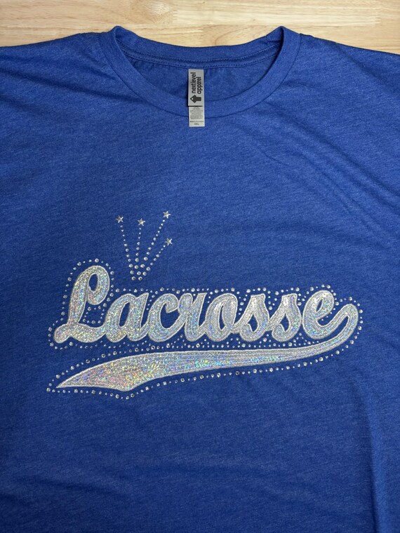 Rhinestones & Sequins Lacrosse spirit wear: 3XL Next Level heathered royal blue t-shirt