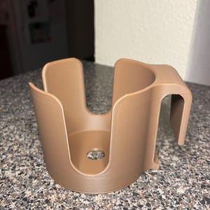 Shopping cart cup holder