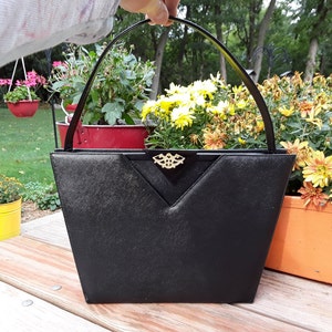 Bolso de mano de vinilo negro de los años 60 con cierre de metacrilato grueso incrustado original de Caprice