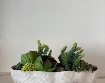 Arreglo de suculentas artificiales