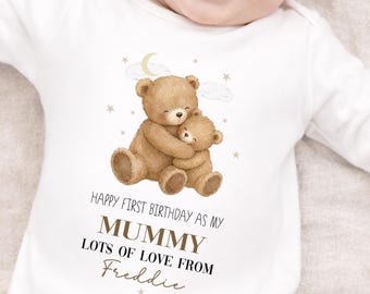 May include: A white long-sleeved baby bodysuit featuring a watercolor illustration of two brown teddy bears hugging under a crescent moon and stars. The text reads: Happy first birthday as my mummy, lots of love from Freddie.