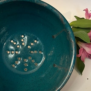Handmade ceramic berry bowl glazed in deep turquoise with speckles