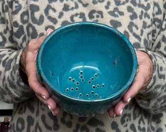 Handmade ceramic berry bowl glazed in deep turquoise with speckles