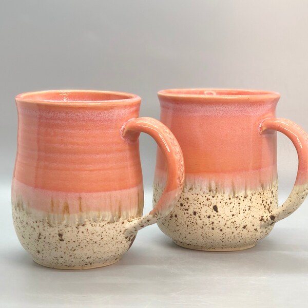 Set of 2 beautiful ceramic coffee mugs handmade on the pottery wheel and glazed in beautiful pink and speckled white with brown specks