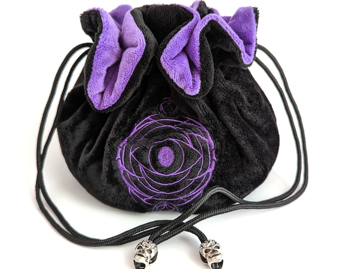 Multi pocket dice bag in black and purple. Transportable dice storage for TTRPG dice and miniatures. Warlock inspired embroidered dice bag