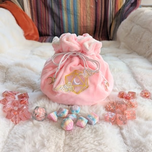 Dreamy Multi pocket dice bag. Transportable dice storage for TTRPG dice and miniatures. D20 moon and clouds embroidered dice bag in pink