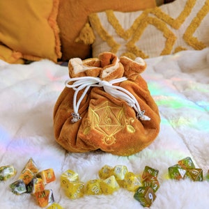Bard Dice Bag. Multi-pocket drawstring dice organizing bag. Transportable dice storage for TTRPG dice and miniatures.
