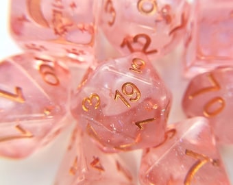Sakura Cloud Dice Set, TTRPG Polyhedral dice, D&D dice, Dungeons and Dragons, Table Top Role Playing. Pink clear resin with copper font