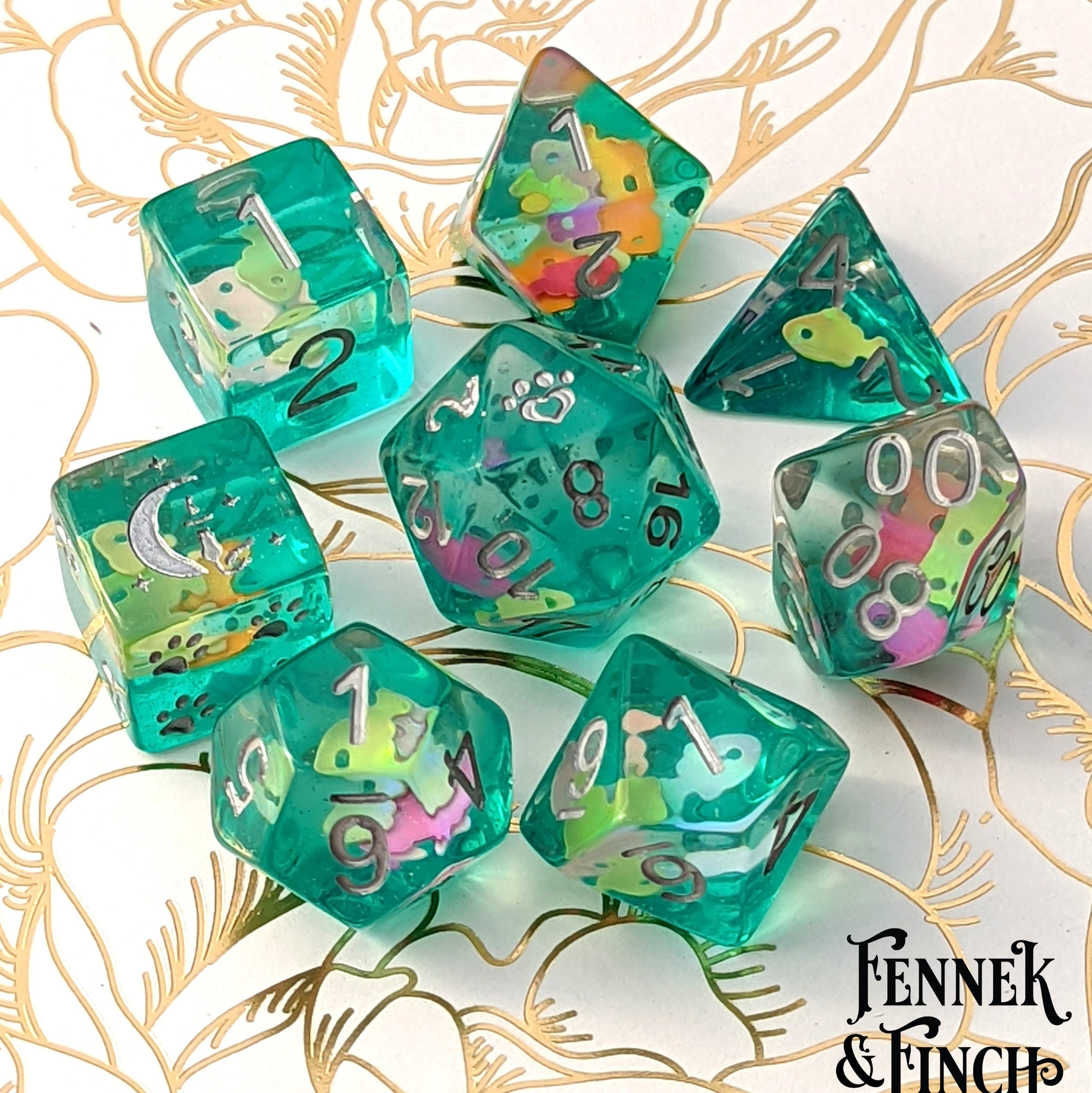 Tropical Fish Dice Set, TTRPG Polyhedral dice, D&D dice, Dungeons and Dragons, Table Top Role Playing. Bright glitter fish on water
