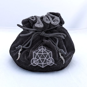 Rogue Dice Bag. Multi-pocket drawstring dice organizing bag. Transportable dice storage for TTRPG dice and miniatures.