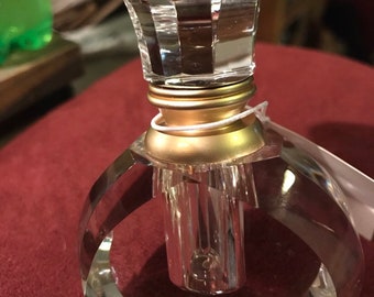 Beautiful crystal perfume dispenser,excellent condition,never used,measures 2.56x1.38x3.82"