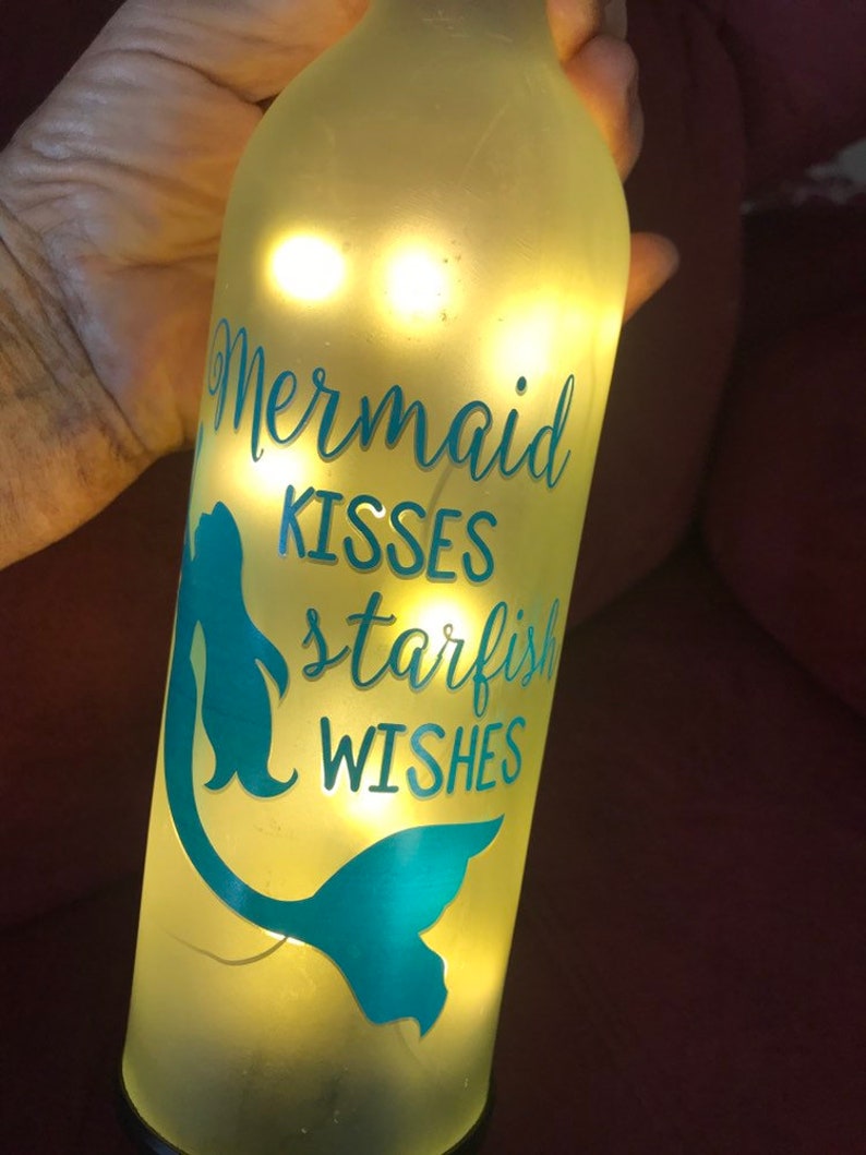 Mermaid kisses starfish wishes,excellent condition,never used,measures 12H 9.25 circumstance,cork bottle with lights,uses 2 AA batteries