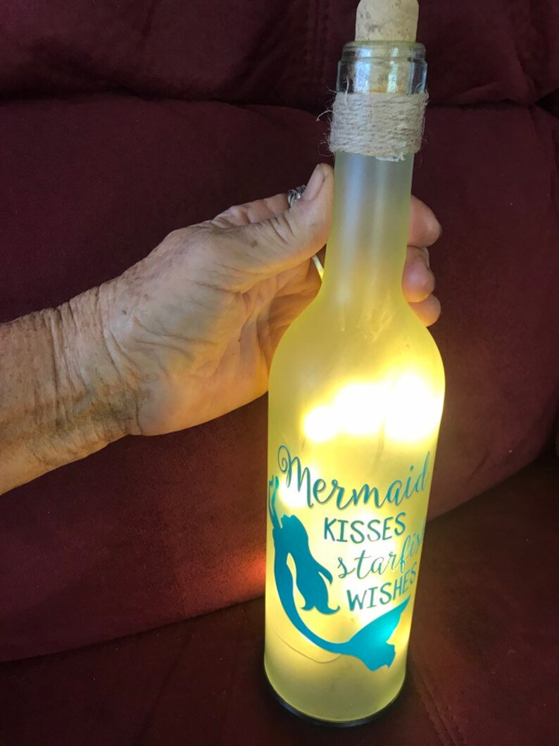 Mermaid kisses starfish wishes,excellent condition,never used,measures 12H 9.25 circumstance,cork bottle with lights,uses 2 AA batteries