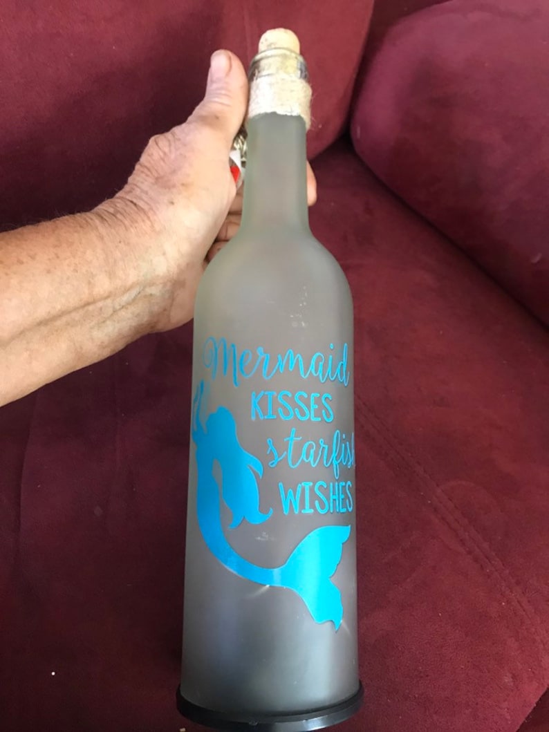 Mermaid kisses starfish wishes,excellent condition,never used,measures 12H 9.25 circumstance,cork bottle with lights,uses 2 AA batteries