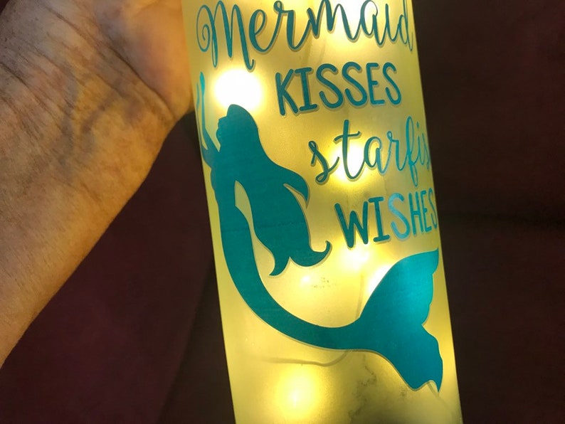 Mermaid kisses starfish wishes,excellent condition,never used,measures 12H 9.25 circumstance,cork bottle with lights,uses 2 AA batteries