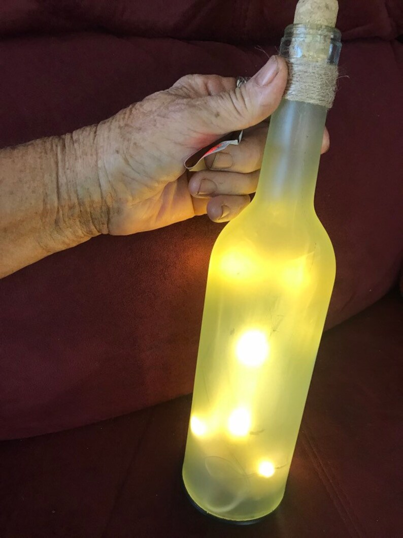 Mermaid kisses starfish wishes,excellent condition,never used,measures 12H 9.25 circumstance,cork bottle with lights,uses 2 AA batteries