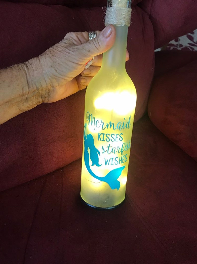 Mermaid kisses starfish wishes,excellent condition,never used,measures 12H 9.25 circumstance,cork bottle with lights,uses 2 AA batteries