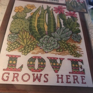 Love grows here,9"x12"counted cross stitch picture kit,"Cactus Love",by Design Works,everthing you need in kit,excellent condition,