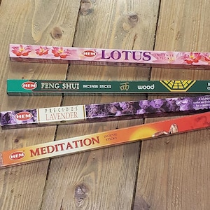 May include: Four boxes of HEM incense sticks. The boxes are labeled "Lotus", "Feng Shui", "Precious Lavender", and "Meditation".