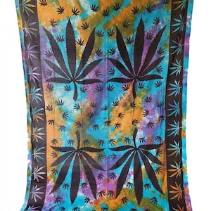 May include: A tapestry with a tie-dye background in shades of blue, orange, purple, and green. The tapestry features a repeating pattern of black marijuana leaves.