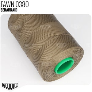 May include: A spool of brown thread with a green plastic center. The thread is labeled "FAWN 0380 SERABRAID".
