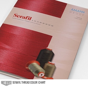 May include: A red color chart for Serafil thread, a brand of polyester thread made by Amann Group. The chart shows different thread sizes, from 8 to 80. The chart also includes a close-up of three spools of thread in different colors.