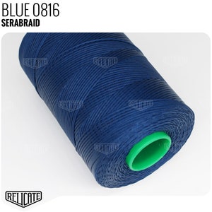 May include: A spool of blue thread with a green plastic end cap. The label on the spool reads "BLUE 0816 SERABRAID".