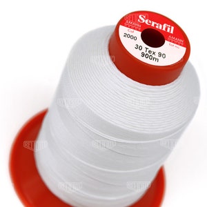 May include: A white spool of Serafil thread with a red label that reads "Serafil", "Amann Group", "Col 2000", "30 Tex 90", and "900m".