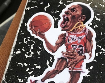 May include: A cartoon illustration of a basketball player wearing a red and white jersey with the word "Chicago" and the number "23" on it. The player is in mid-air, holding a basketball and wearing red and white trainers. The image has a white background and the text "DETT PROJECT .COM" at the bottom.