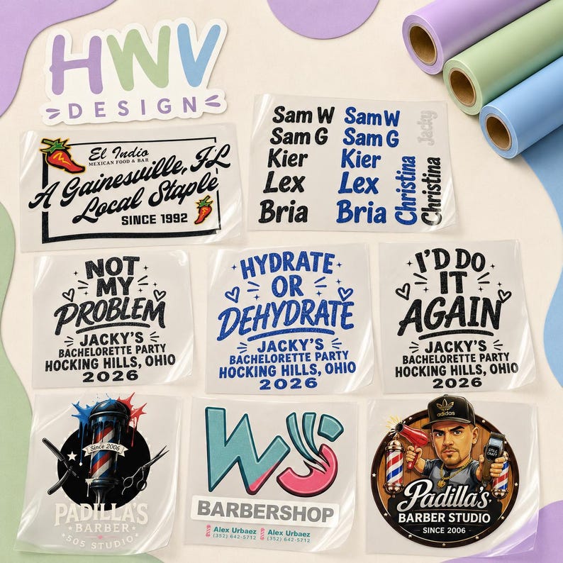 May include: A collection of custom stickers and decals, featuring various designs and text. Designs include names, bachelorette party themes, and business logos. The color palette includes blue, white, black, and pink. Rolls of vinyl in pastel colors are visible in the background.