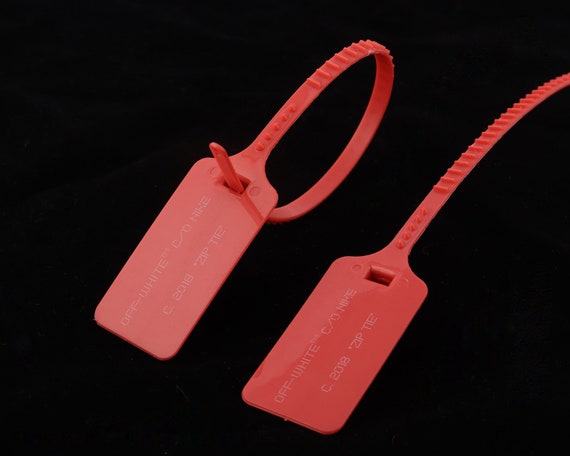 red tag on trainers