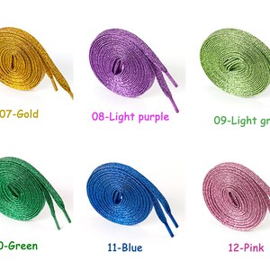 May include: Six pairs of sparkly shoelaces in different colors: gold, light purple, light green, green, blue, and pink.