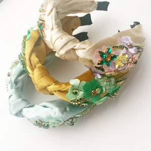 Top knot headbands with embellishments