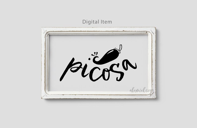 May include: Black and white digital print of a chili pepper with the word "picosa" written in a cursive font. The print is framed in a white frame.